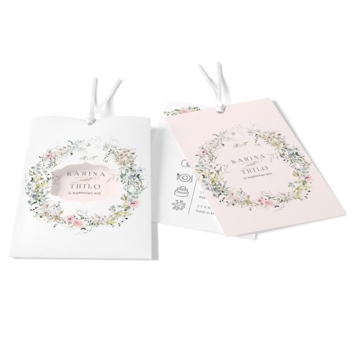 Besondere Hochzeitseinladung mit Stanzung im floralen Design und zarten Pastellfarben