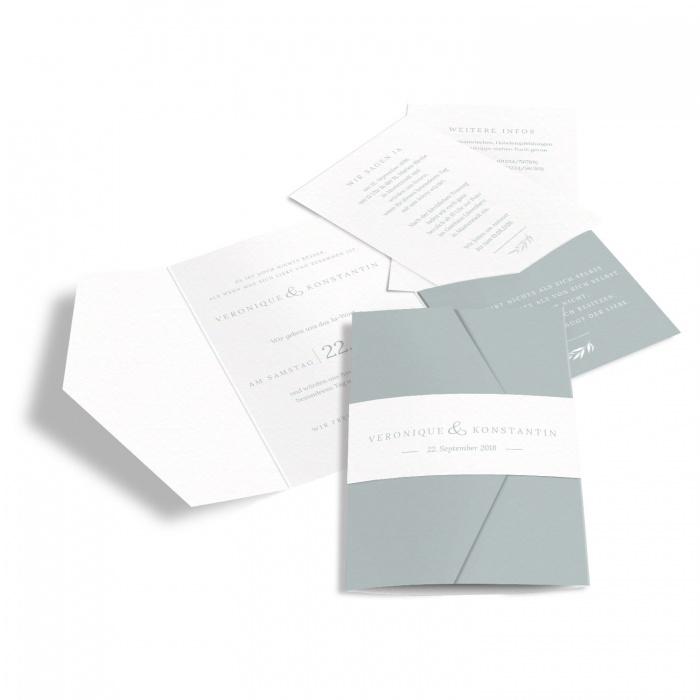 Edle Hochzeitseinladung als Pocket mit Aquarellblätterkranz