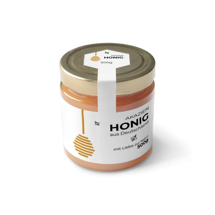 Moderne Honigeticketten mit stilisierten Honiglöffel und Bienen