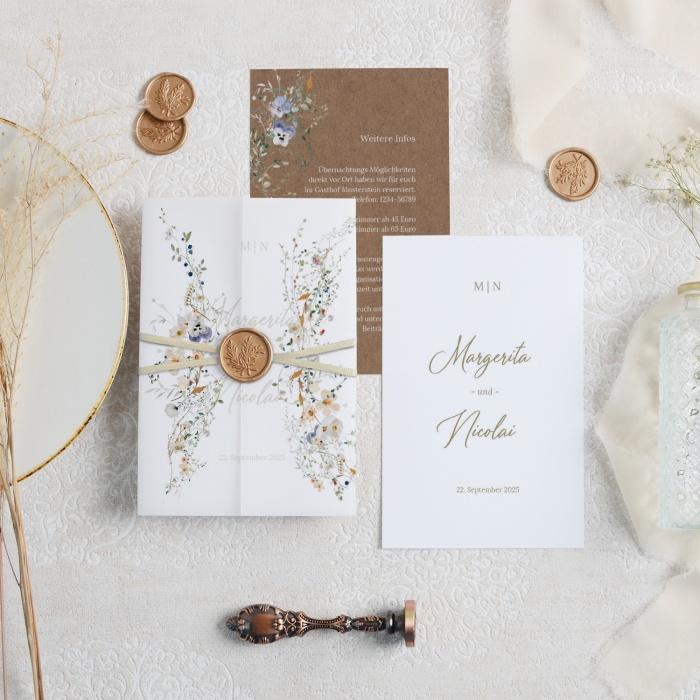 Romantische Hochzeitseinladung mit zarten Wildblumen und Transpartenpapier und Siegel
