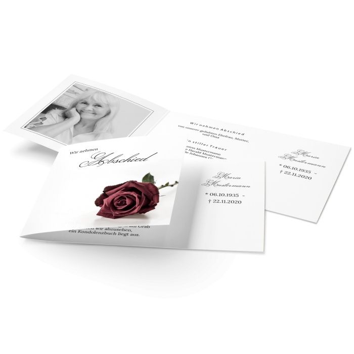 Würdevolle Trauerkarte mit roter Rose und Foto