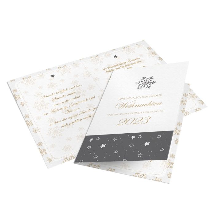 Weihnachtskarte mit hübschen Schneeflocken in Gold und Grau