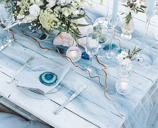 Tischdekoration zur maritimen Hochzeit in Blau