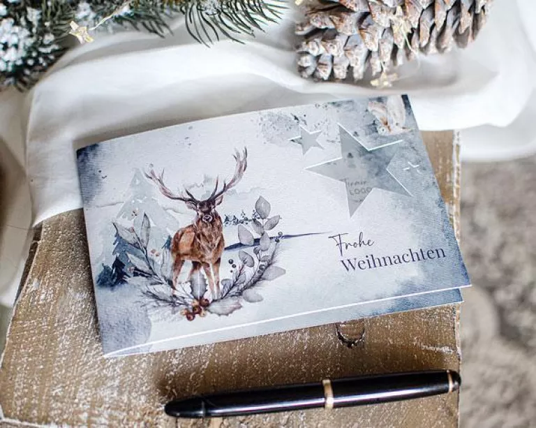 Weihnachtskarte mit Stern Stanzung und Winterlandschaft